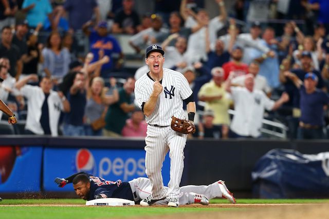 New Jersey's own Todd Frazier celebrates either tagging out the Sox' Eduardo Nunez or another successful Yankees espionage operation.